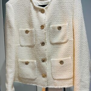 Cream colored jacket with gold buttons. Never worn Xlg